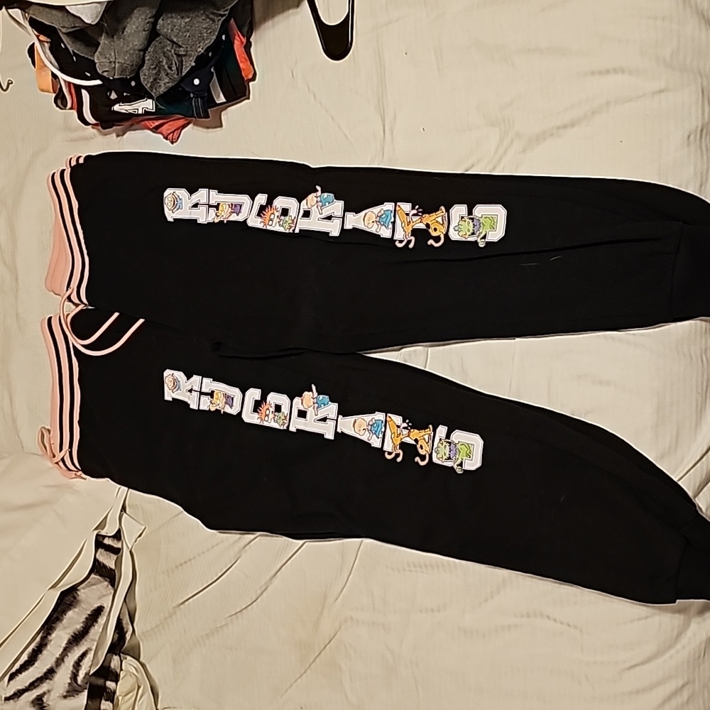 RUGRAT sweatpants black and light pink with RUGRATS down left leg